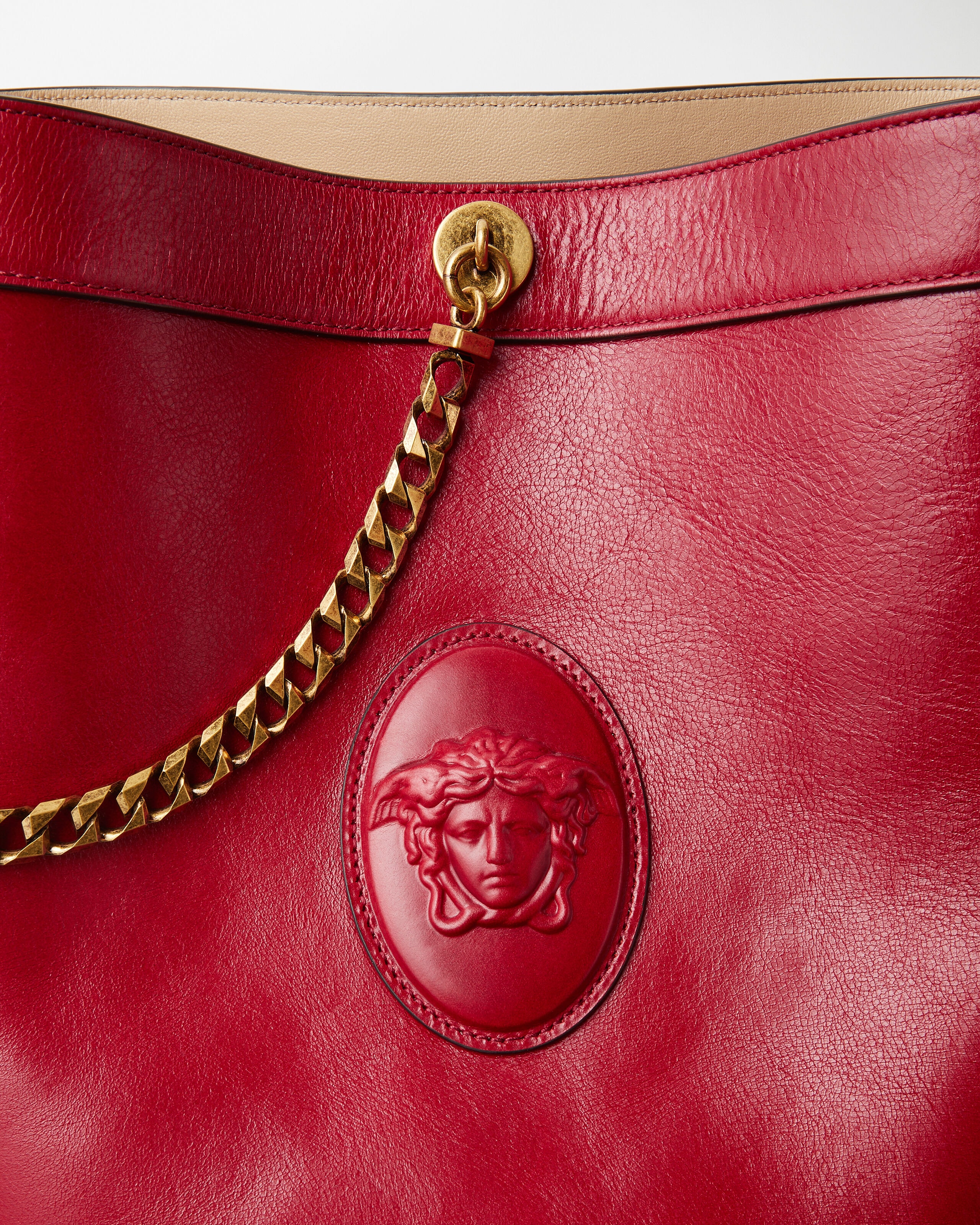 ピヴォ スモール レザー バケット バッグ レッド | VERSACE JP