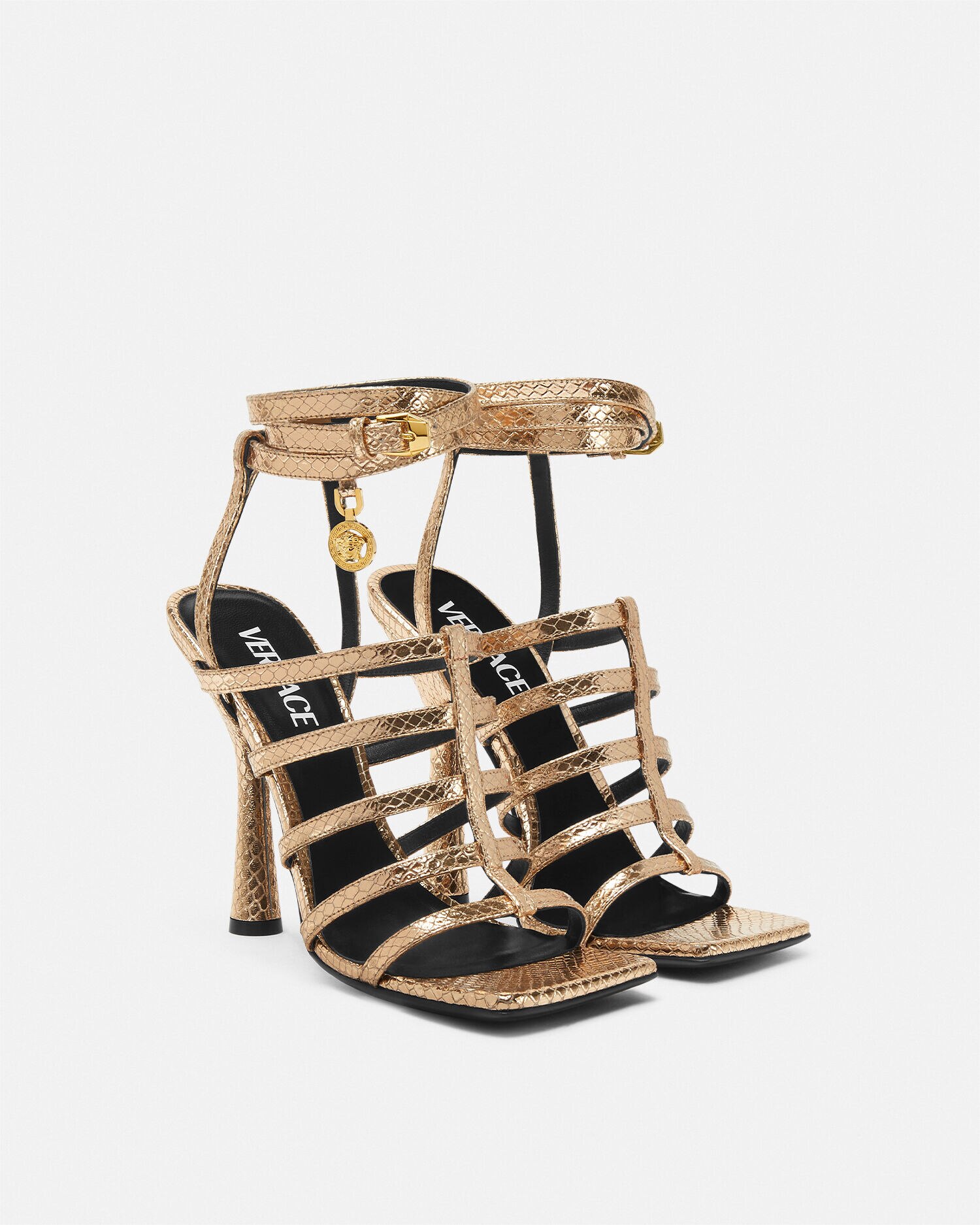 リュキア スネーク調 ケージ サンダル 110 mm ゴールド | VERSACE JP